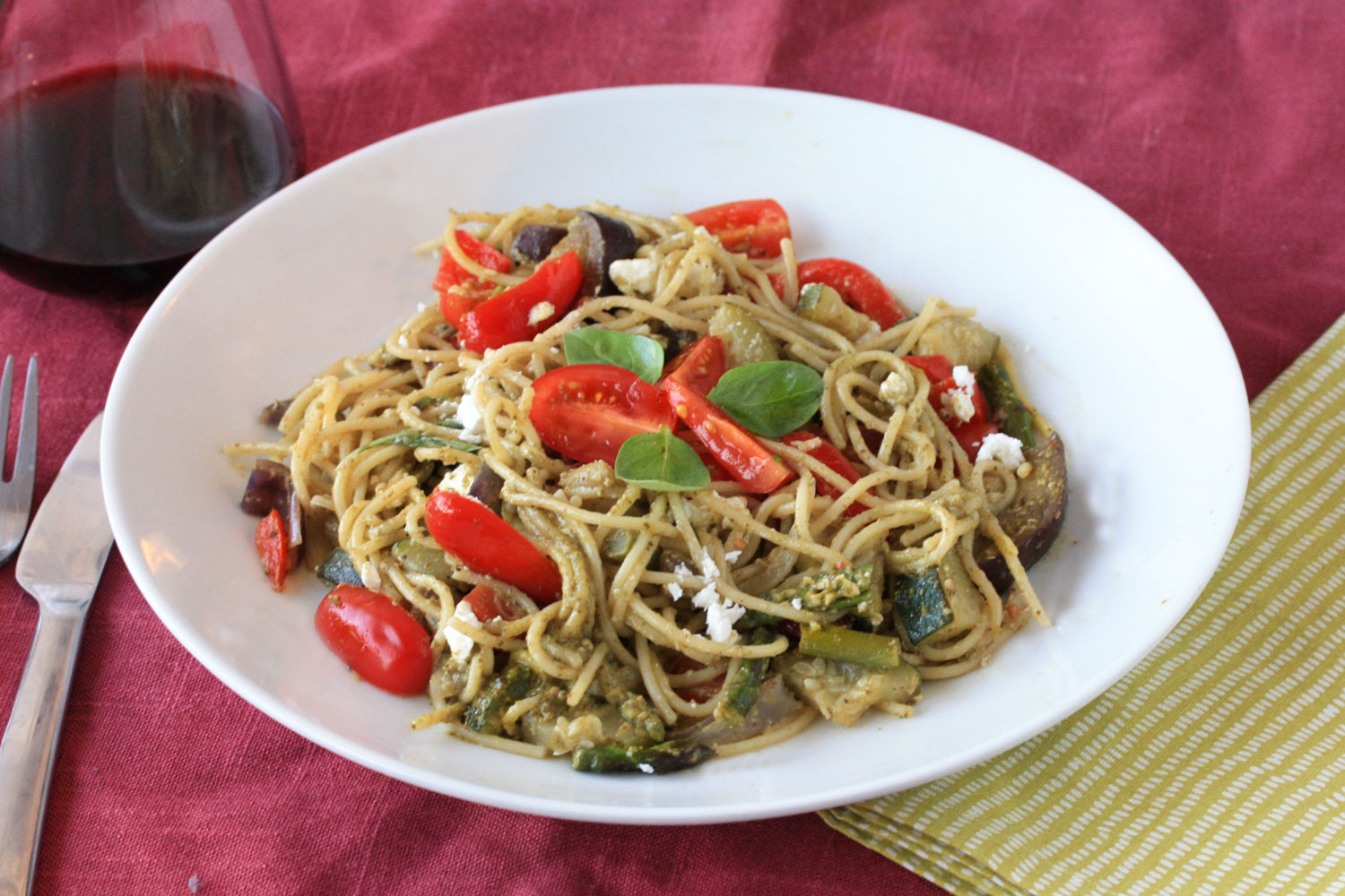 Roast vegetable spaghetti with basil pesto and cherry tomatoes