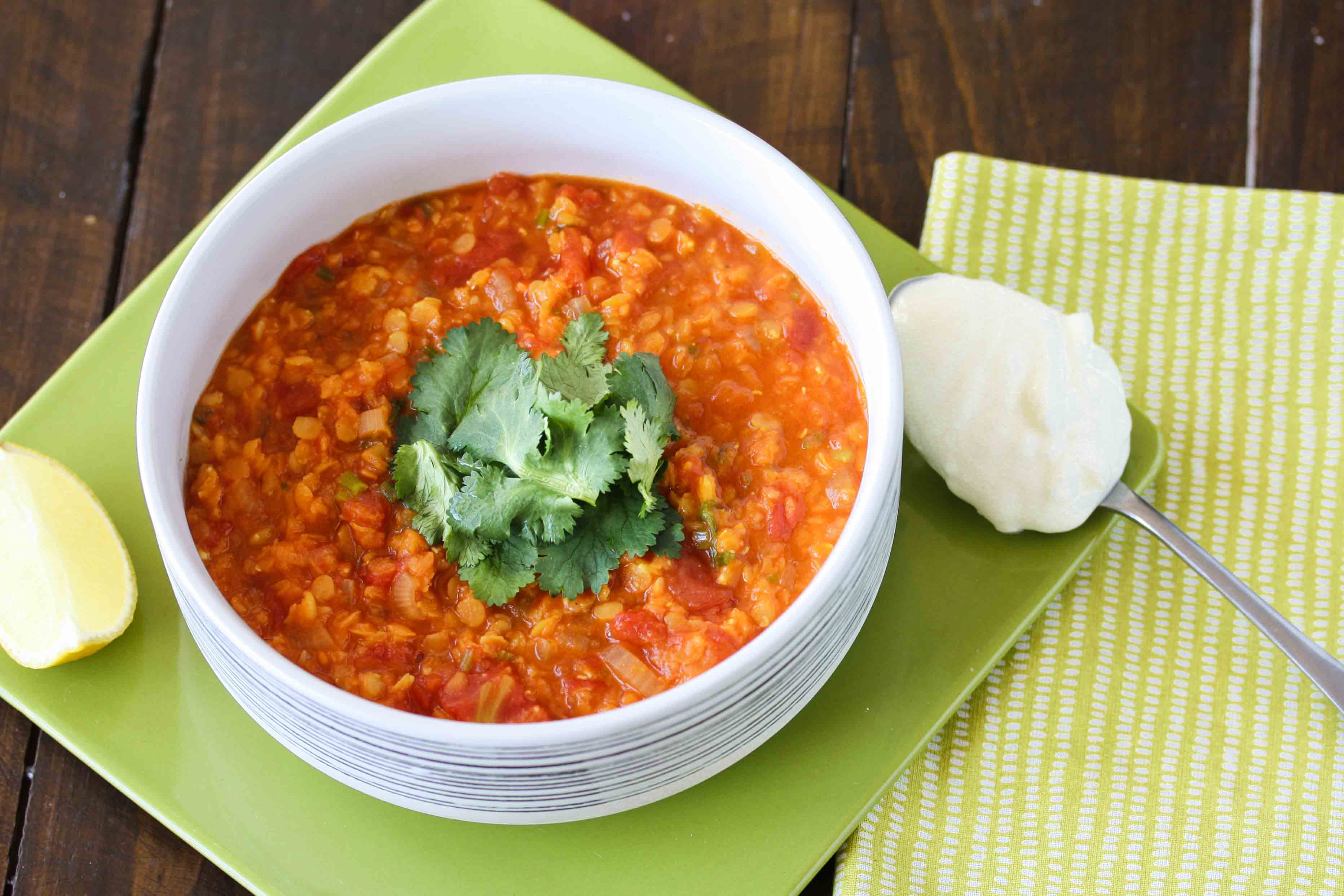 Spicy red lentil, tomato and lime soup with coriander