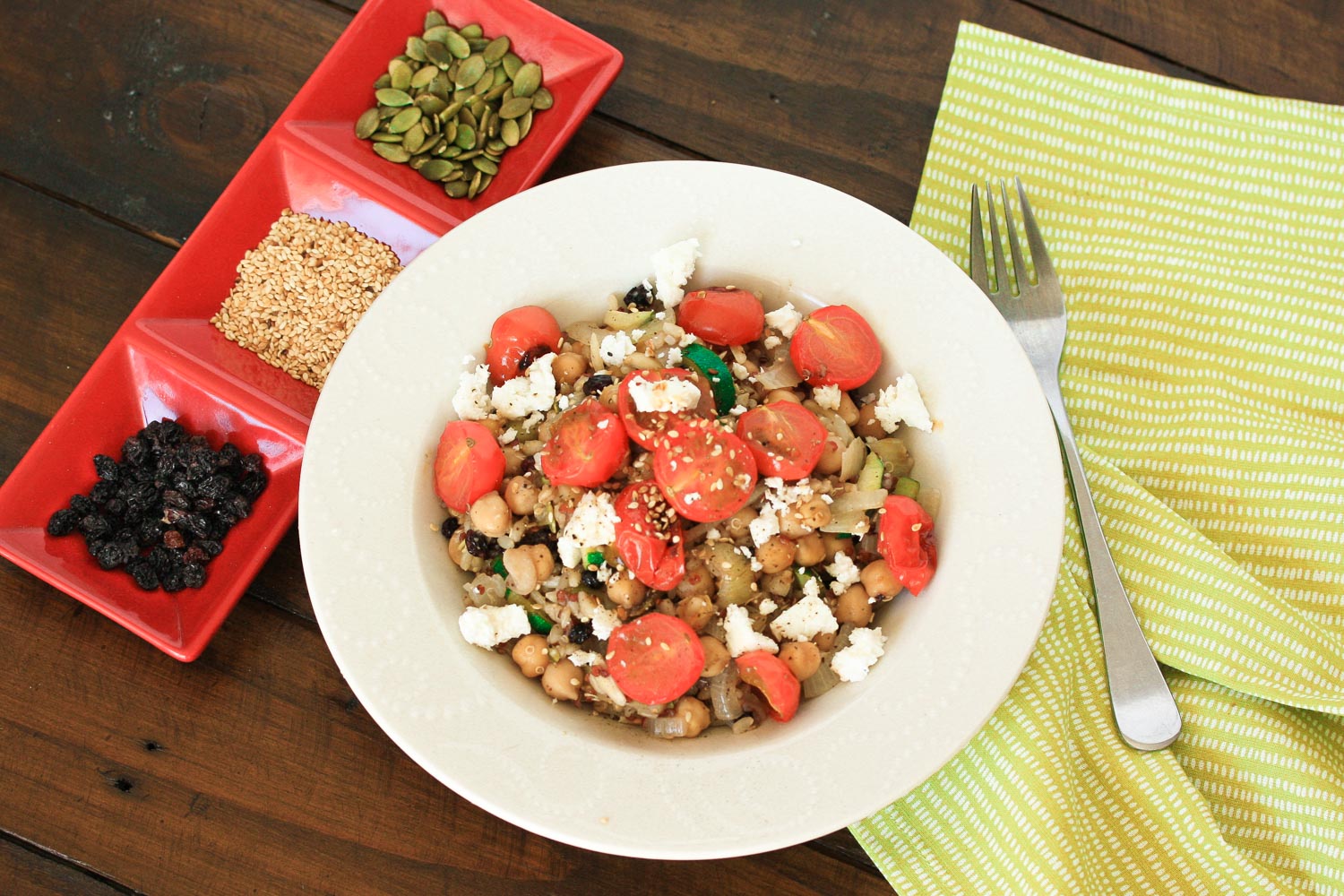 Super-filling seeds and grains salad with roasted cherry tomatoes